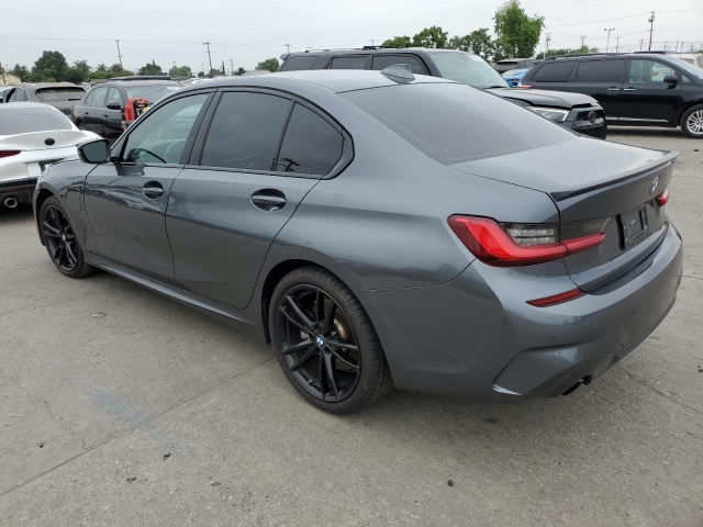 2021 BMW 330E слева сзади