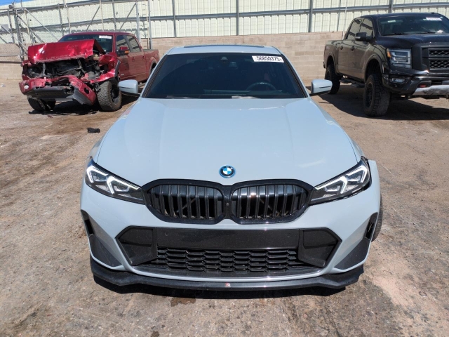 2023 BMW 330E спереди