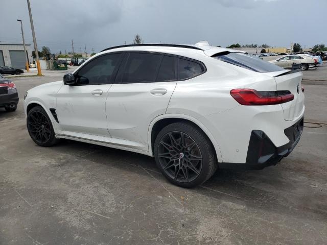 2022 BMW X4 M слева сзади