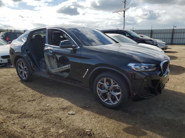 2022 BMW X4 XDRIVE30I справа спереди